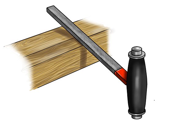 Image showing a DIYer using a file mounted in an ergonomic handle to debur a metal object