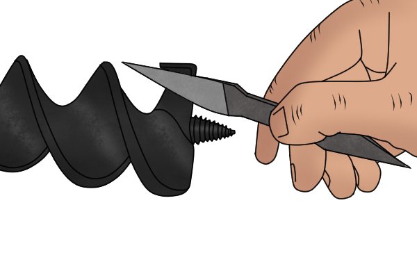 An auger bit being sharpened by an auger bit file