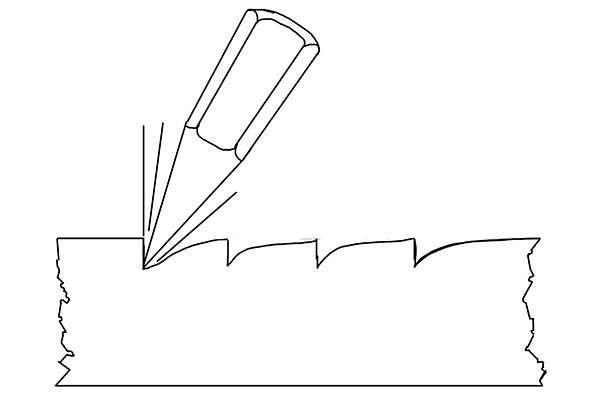 Illustration of the way a chisel is used to cut teeth into a file
