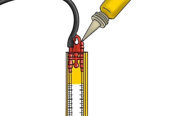 Step 2 Carefully pour the selected indicating fluid into the u-tube until the fluid level is at the 0 mbar mark on the scale.