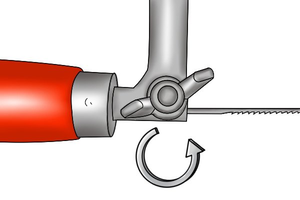 Loosen the wing nut closest to the handle by turning it anticlockwise.