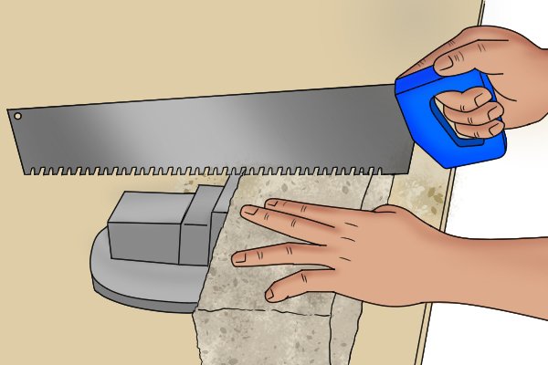 How to hold a masonry saw correctly