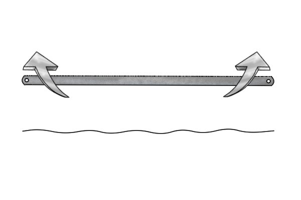  If you turn a junior hacksaw blade on its side, you will see that the teeth are set in a wavy line. 