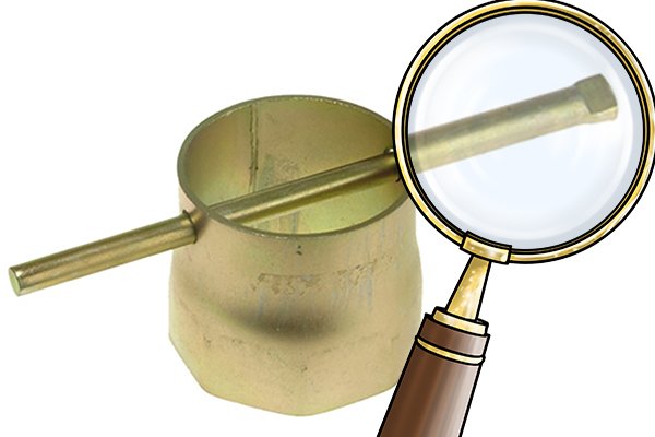 Image showing a tommy bar under a magnifying glass