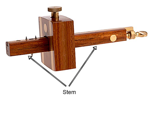 Parts of a mortise marking gauge; stem, main body of the gauge holding the spurs and fence