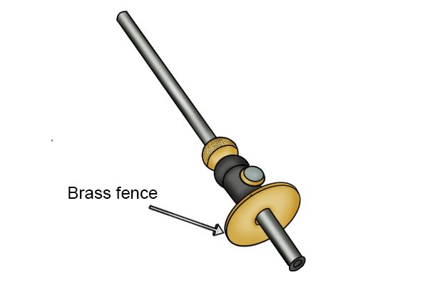 Brass fence on wheel marking gauge