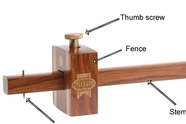 Parts of a marking gauge; stem, fence, pin / spur and thumb screw. used to mark wood 