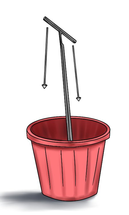 Position yourself above the bucket, standing with your feet on either side.