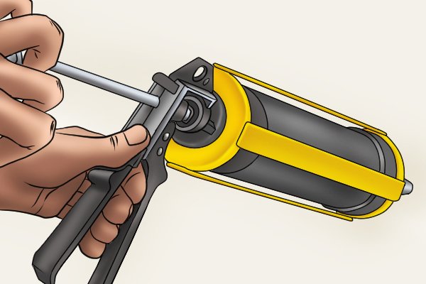 pressing the trigger, grouting gun how to use a pointing gun, tools wonkee donkee tools DIY guide