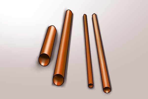 different lengths of copper pipe, pipe bending spring, plumbing tool