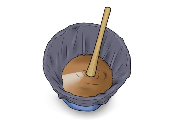 Pickaxe soaking in a bucket of water