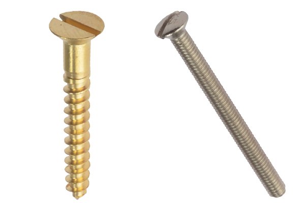 Slotted screw drive on a gold wood screw and a silver socket screw
