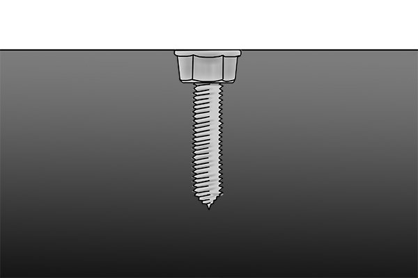 An example of a silver machine screw in a piece of steel