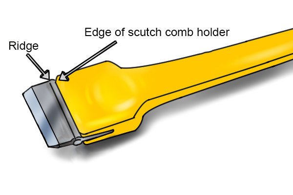 Labelled ridge and the edge of the scutch comb holder on a scutch chisel