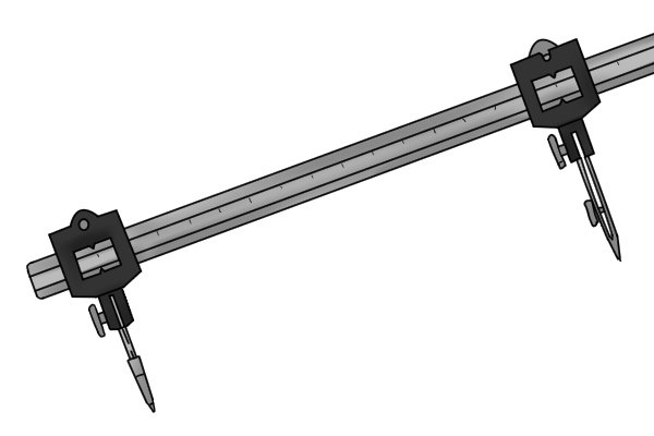 Like dividers, when used with a beam, trammel heads are an effective transfer measuring tool. The trammel points are positioned on either side of an object or set distance. The distance between the trammel points is then checked against a measuring device like a ruler. 
