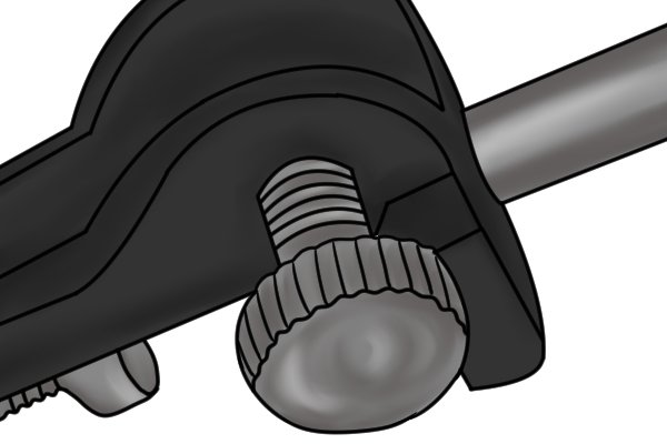 At least one trammel head in each pair has a clamping nut. When the nut is loosened, the metal point can be removed and replaced with a pencil or a sharp blade. It is then tightened to secure the drawing or cutting tool in place.