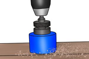Illustration of a hole saw in use.