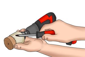 How to remove slug from a hole saw with a screwdriver.