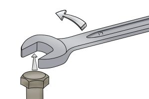 Using a standard spanner to twist a nut.