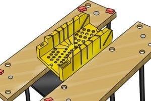 Placing a mitre box on work bench in preparation