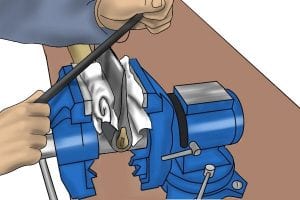 Using a semicircular angle file the axe