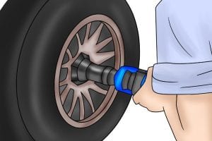 Impact socket in use removing nuts from a tyre