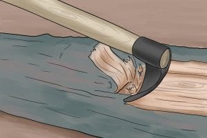 Adze cutting through wood