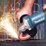 Makita 9557PBX1 Angle Grinder in use