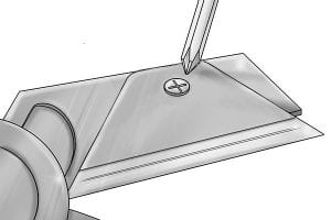 Fastening in a new mitre shear blade