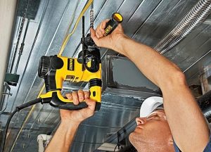 Drilling into metal ceiling with SDS plus drill.