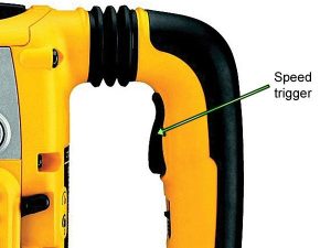 The speed trigger on a DeWalt SDS Max Drill.