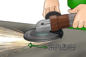 Sparks should be directed away from the user for safety.