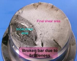 Steel bar broken due to brittleness.