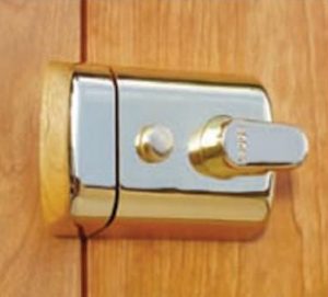 Fitted night latch mounted on to a door.