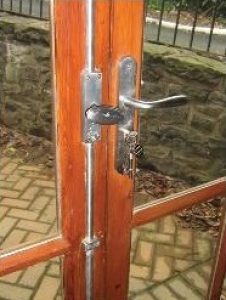 Example of French doors with espagnolette lock handles.