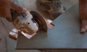 Example of how to cut wall and floor tiles using an angle grinder.